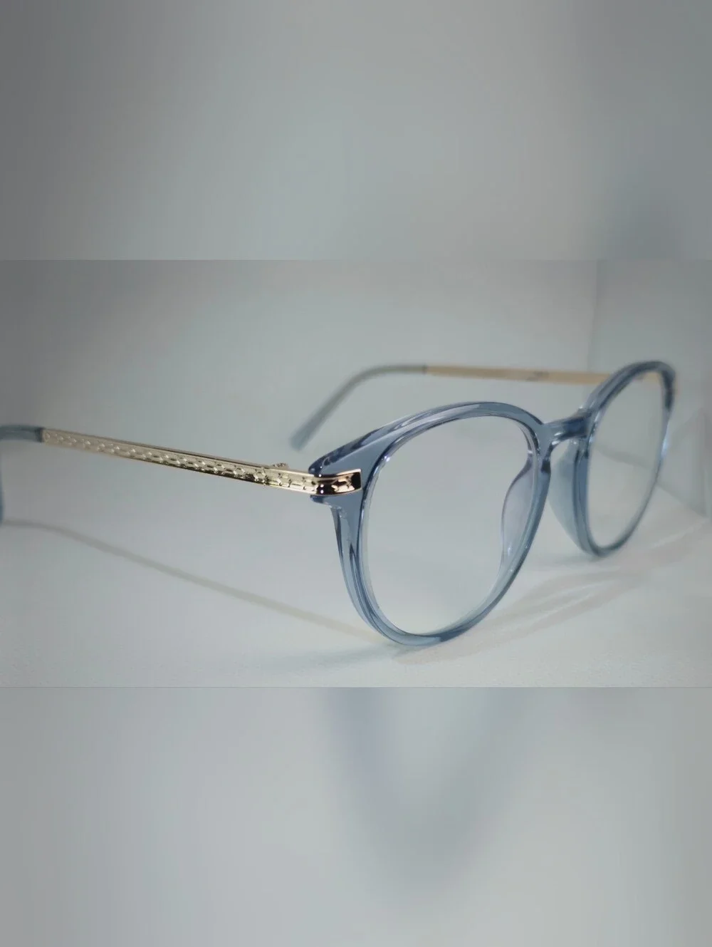 Daphine. Baby Blue. Round Gold Metal Temple.
